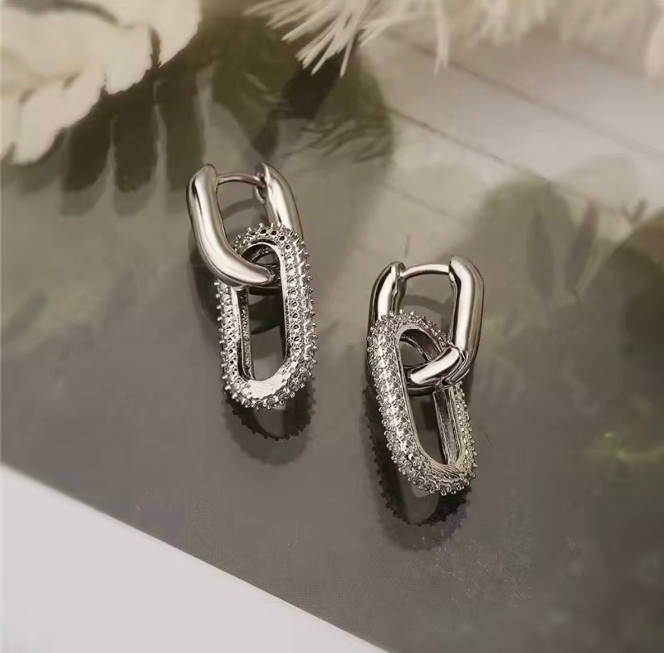 Aretes colgantes rodinados con Cz silver