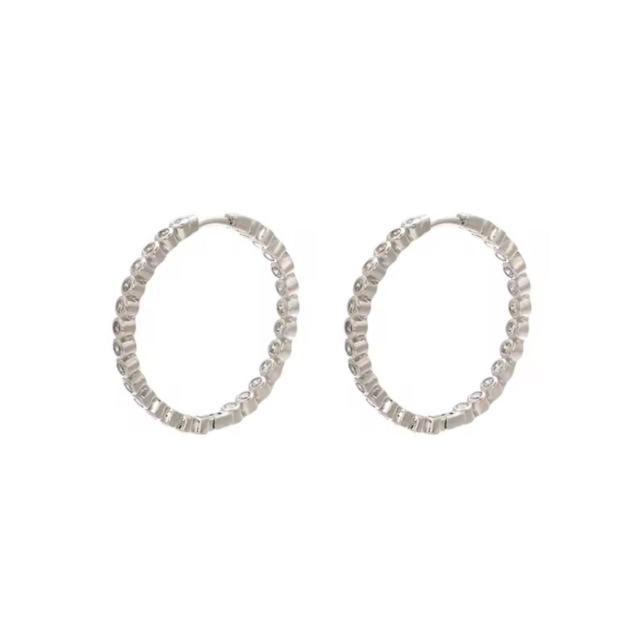 Argollas pequeñas rodinadas silver con Cz