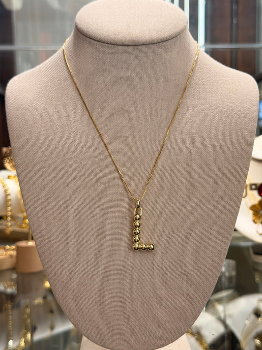 Cadena de letra L de balines rodinado