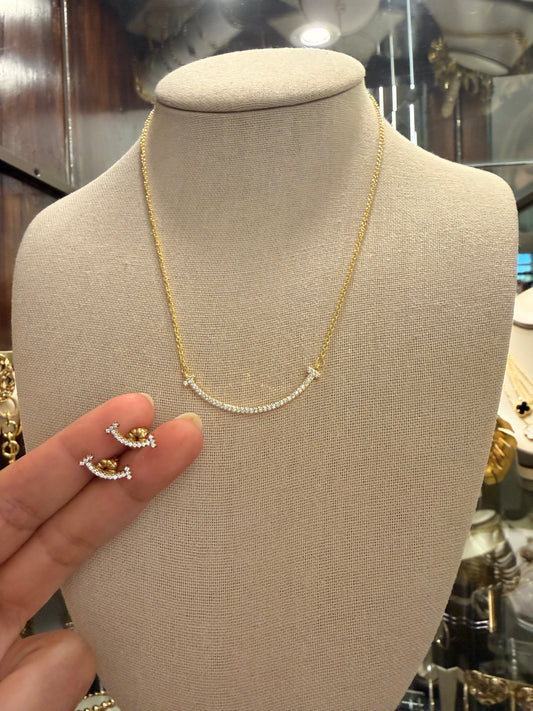 Set smile cuello y aretes en plata 925 rodinado con baño de oro y Cz