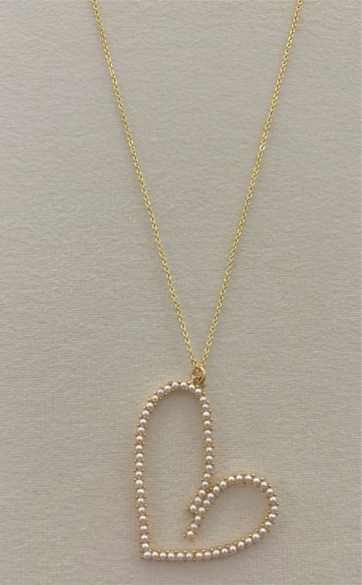 Cuello de corazón con perlitas rodinado Gold