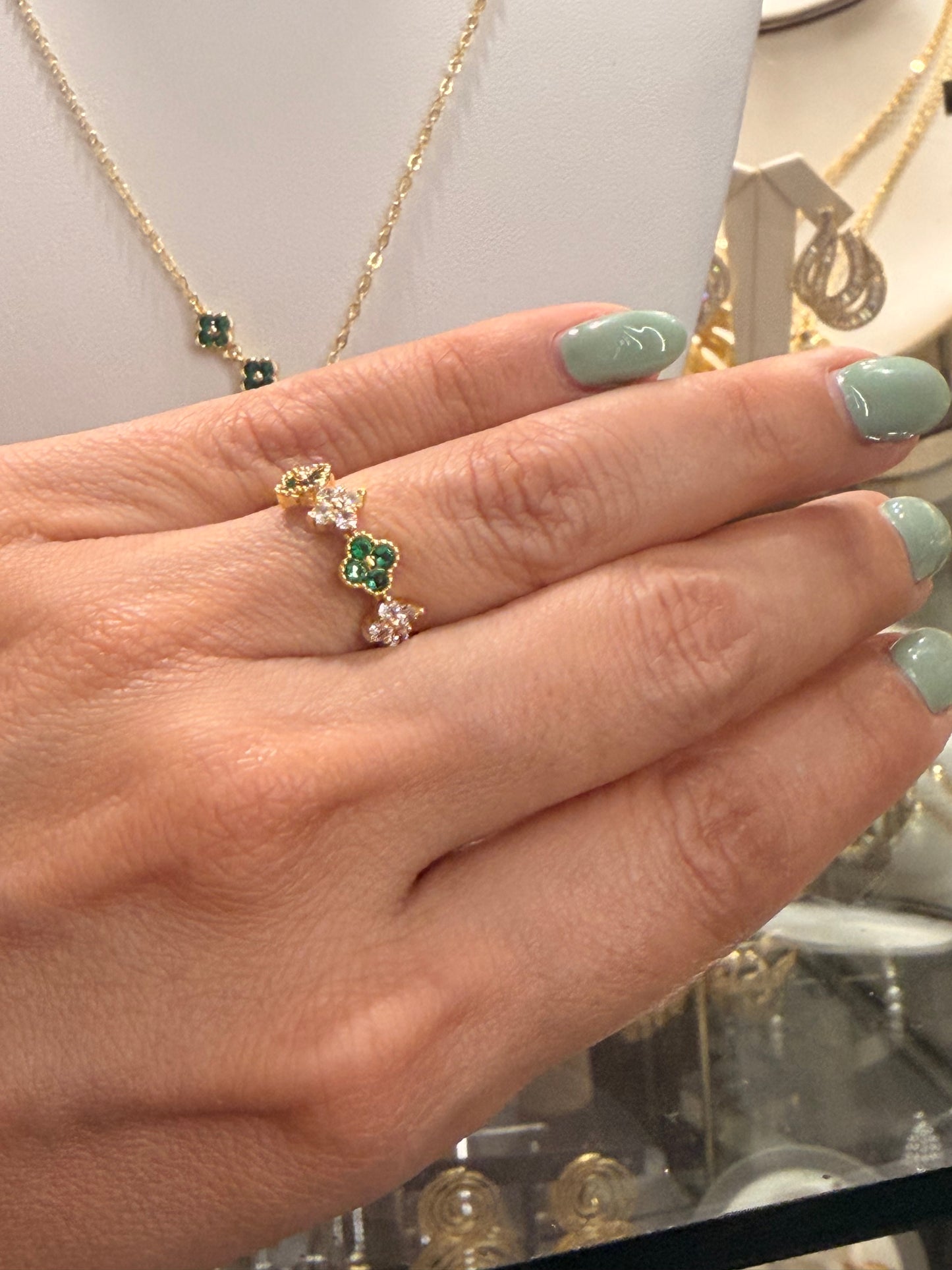 Set de flor con Cz green y blancos rodinado Gold