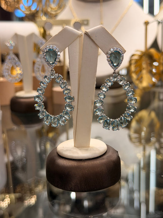 Aretes con Cristales celestes rodinados silver