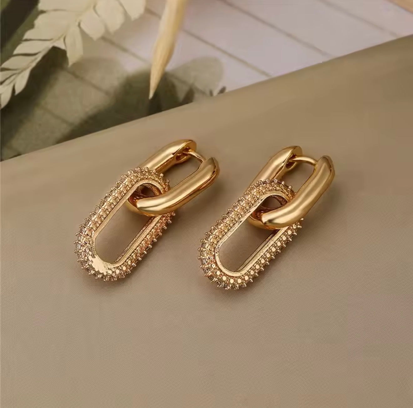 Aretes colgantes rodinados con Cz Gold
